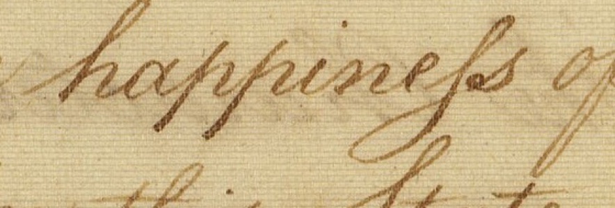 Handwritten word happiness ending in a long s and round s