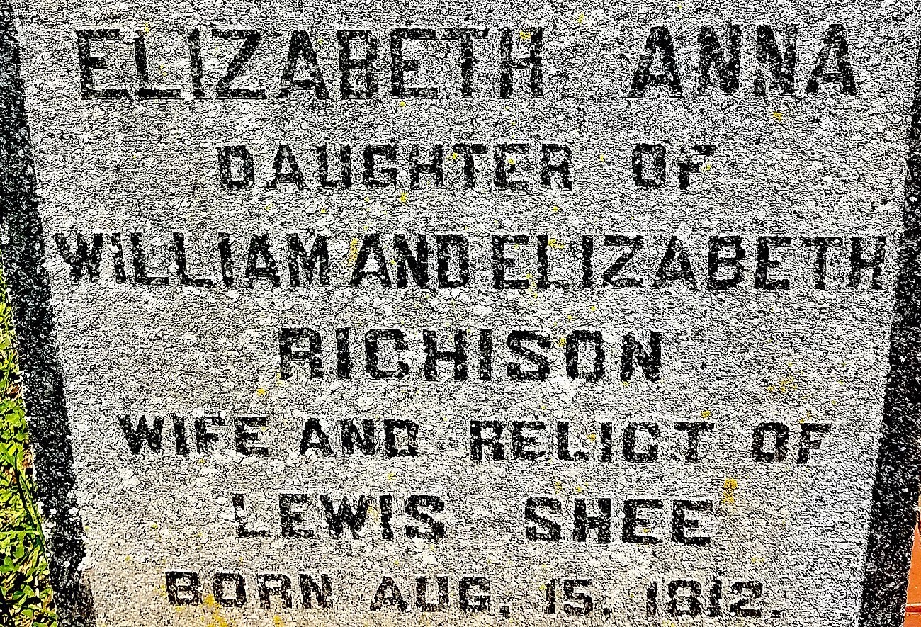 Granite gravestone in capital letters: Elizabeth Anna, daughter of William and Elizabeth Richison, wife and relict of Lewis Shee, born Aug. 15, 1812